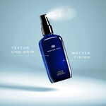 Sprühende Flasche des GRAHAM HILL COLIN Extra Dry Texture Spray mit den Hinweisen Textur und Grip sowie mattes Finish