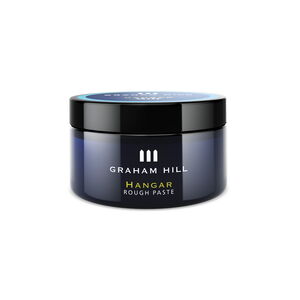 Mattierende HANGAR Rough Paste von GRAHAM HILL in einer dunkelblauen 100-ml-Dose mit schwarzem Schraubdeckel