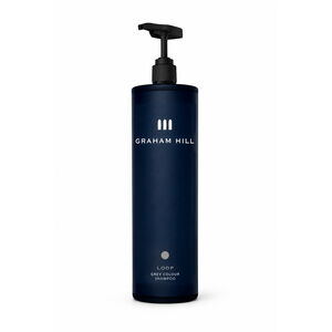 Farbpflegendes LOOP Grey Colour Shampoo von GRAHAM HILL in einer dunkelblauen 1000-ml-Pumpflasche mit schwarzem Spender