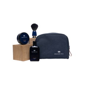 GRAHAM HILL SHAVING SET mit Rasierseife, Rasierpinsel, After Shave Tonic und dunkelblauer Kosmetiktasche.