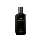 Farbpflegendes LOOP Grey Colour Shampoo von GRAHAM HILL in einer dunkelblauen 200-ml-Flasche mit schwarzem Verschluss.