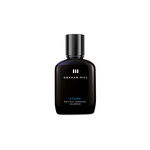 Schwarze 100-ml-Flasche STOWE WAX OUT CHARCOAL SHAMPOO von GRAHAM HILL mit schwarzem Verschluss und weisser Beschriftung.