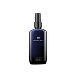 Extra stark festigendes LUFFIELD Flexible Styling Spray von GRAHAM HILL in einer dunkelblauen 200-ml-Sprühflasche mit schwarzem Pumpaufsatz