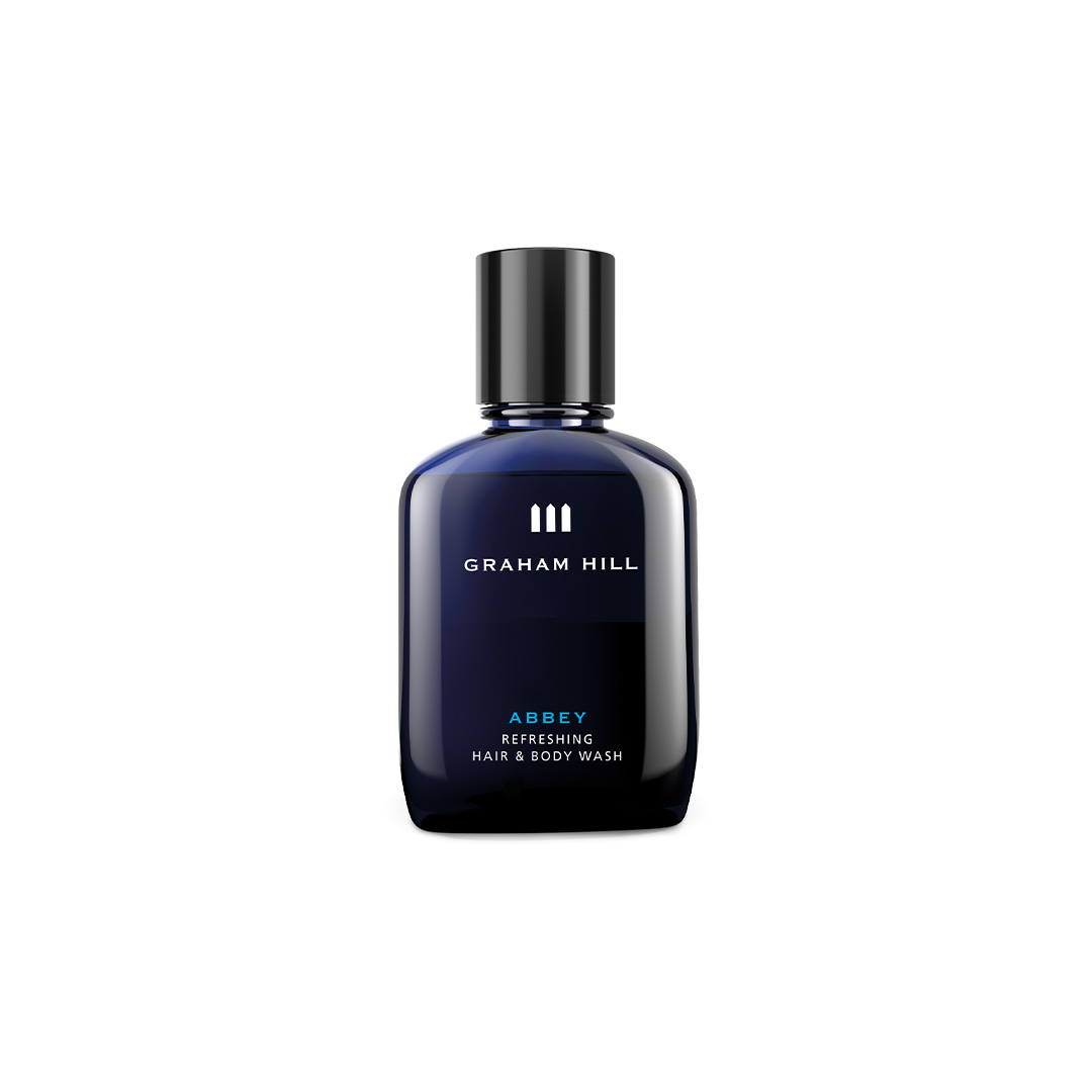GRAHAM HILL ABBEY Refreshing Hair & Body Wash in dunkelblauer 100-ml-Flasche auf weißem Hintergrund