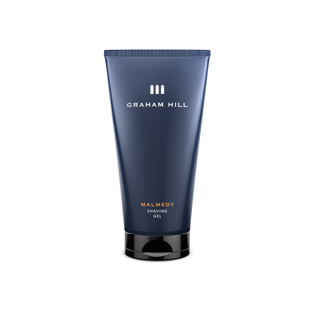 Transparentes MALMEDY Shaving Gel von GRAHAM HILL in einer dunkelblauen 150-ml-Tube mit schwarzem Verschluss